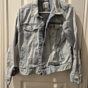 Junior's Mudd light distressed denim jacket. Size Large.